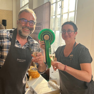 Emmanuelle and Stephen from George & Joseph Cheesemongers with their award