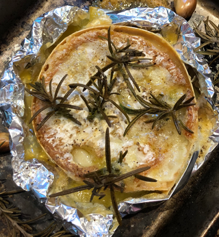 baked english camembert tunworth with rosemary and garlic